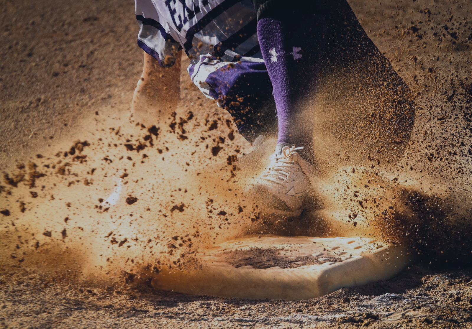 Baseball player lands on base